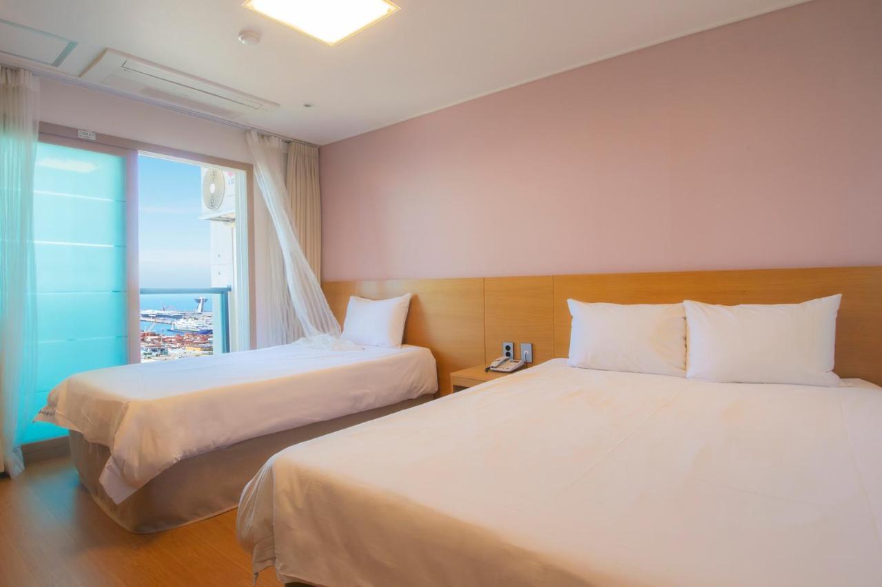 Sims Hotel Jeju Esterno foto